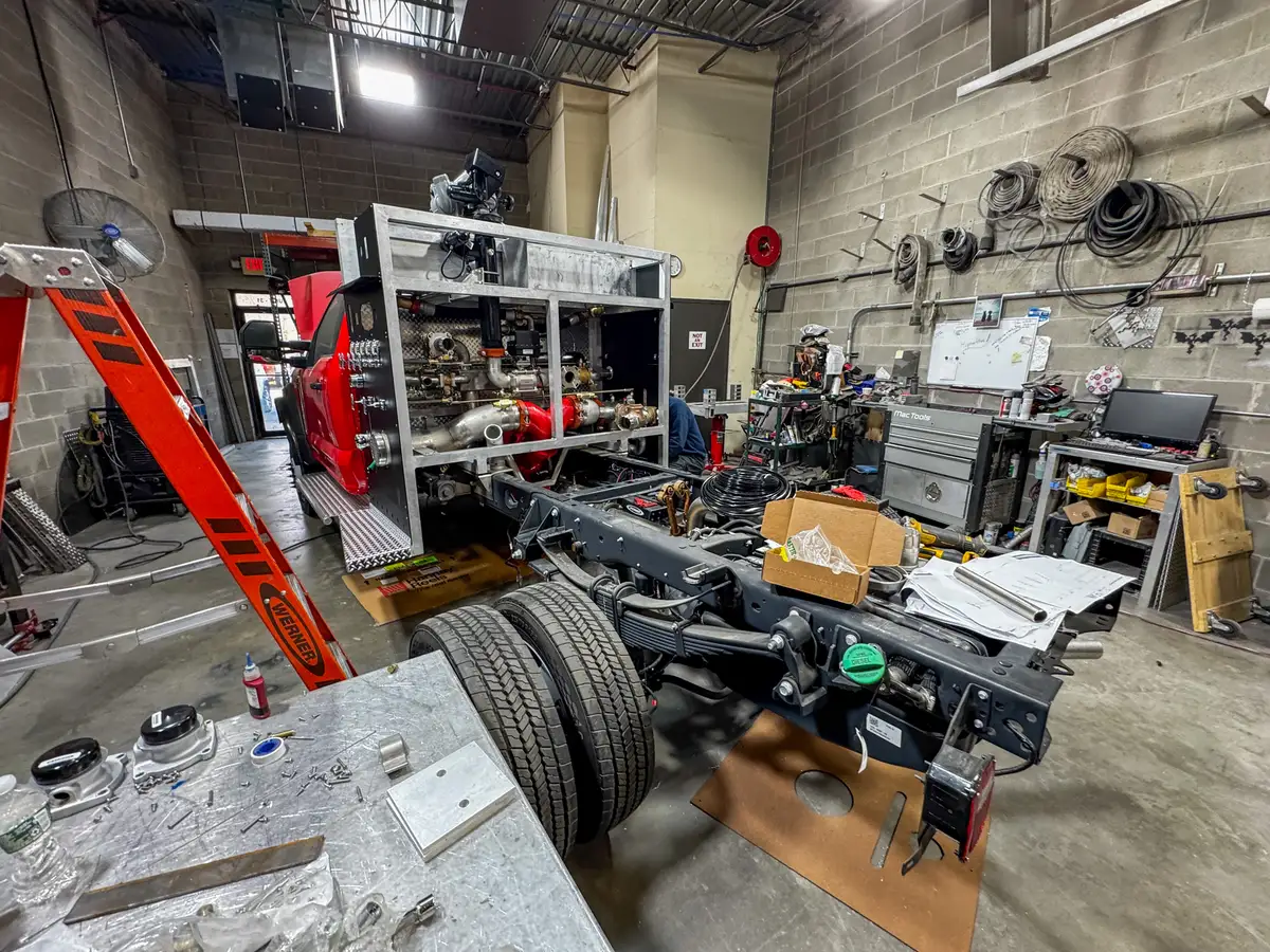 Partially assembled apparatus body on shop floor, photo 150 of 179.