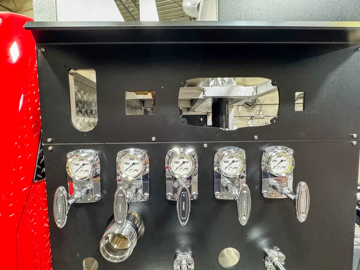 Pump plumbing and valves inside body compartment, photo 154 of 179.