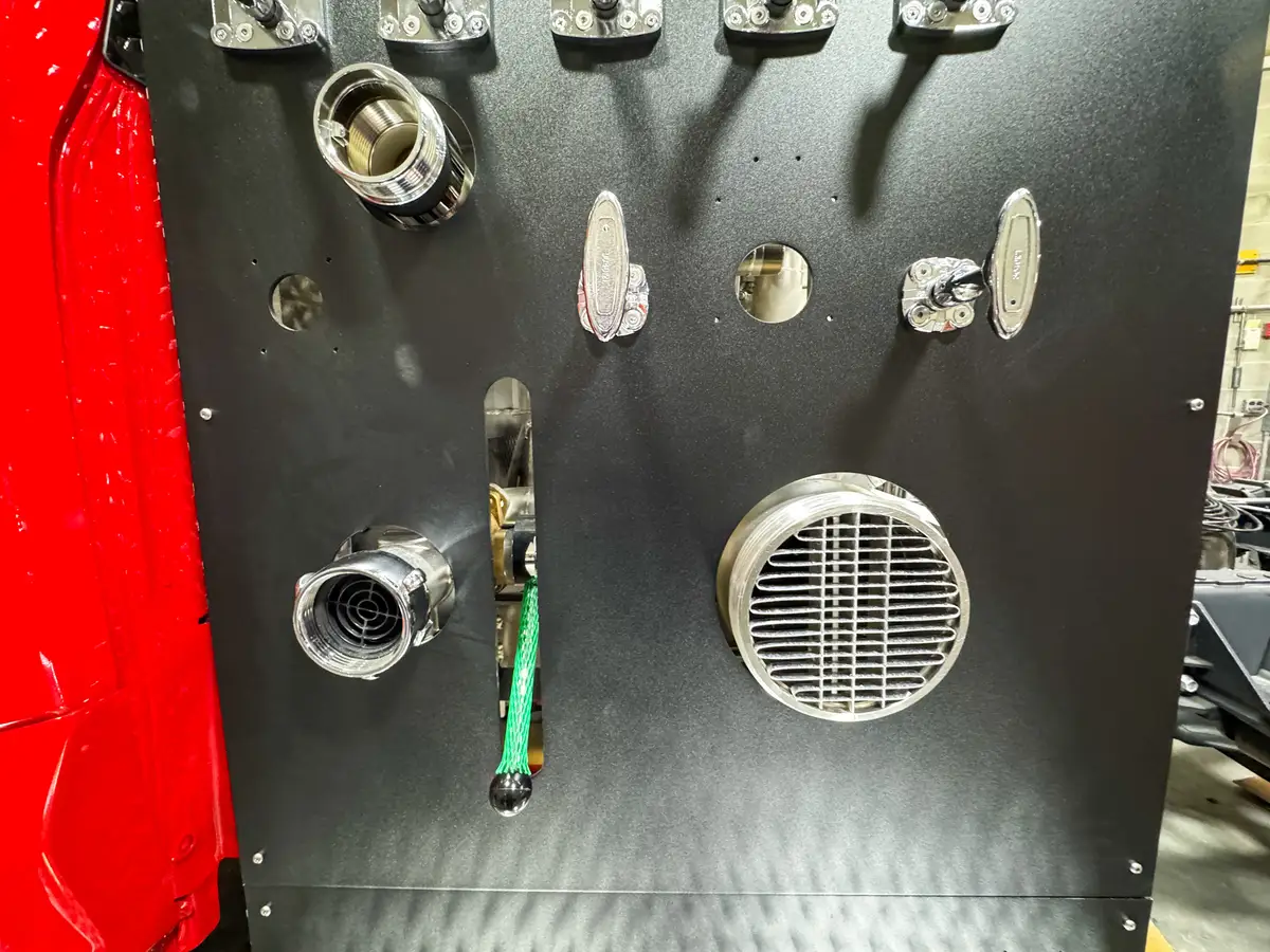 Cab interior during upfit with exposed wiring, photo 155 of 179.