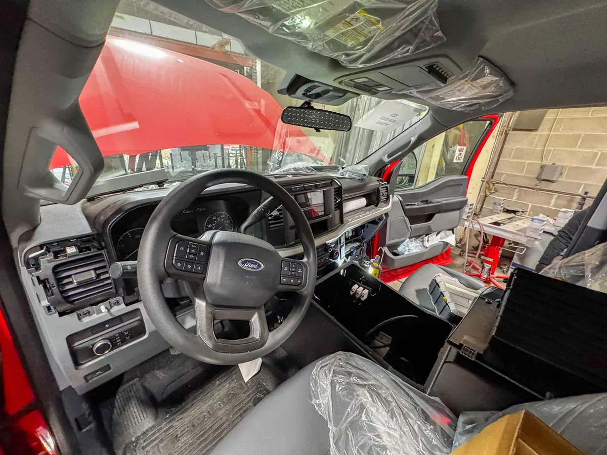 Body panels staged in production area, photo 158 of 179.