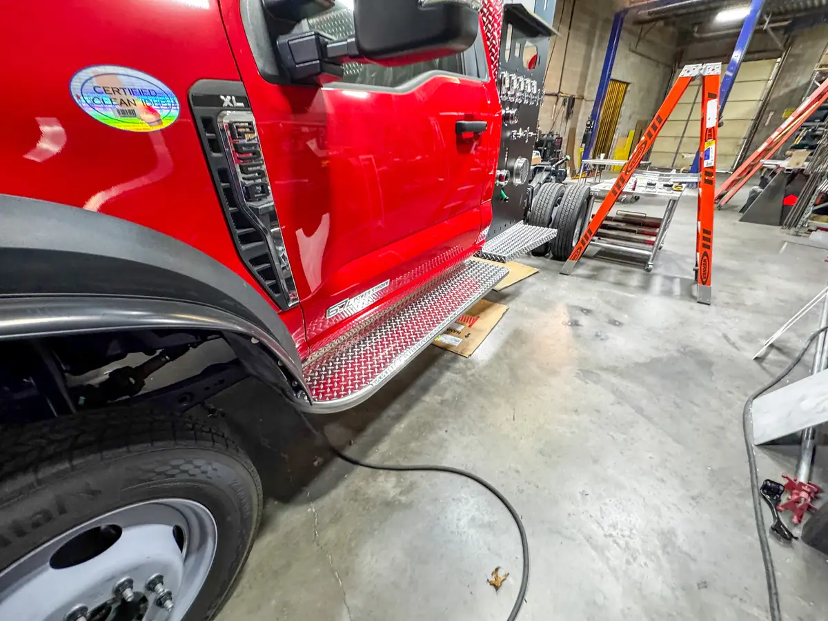 Open compartment with unfinished interior surfaces, photo 159 of 179.