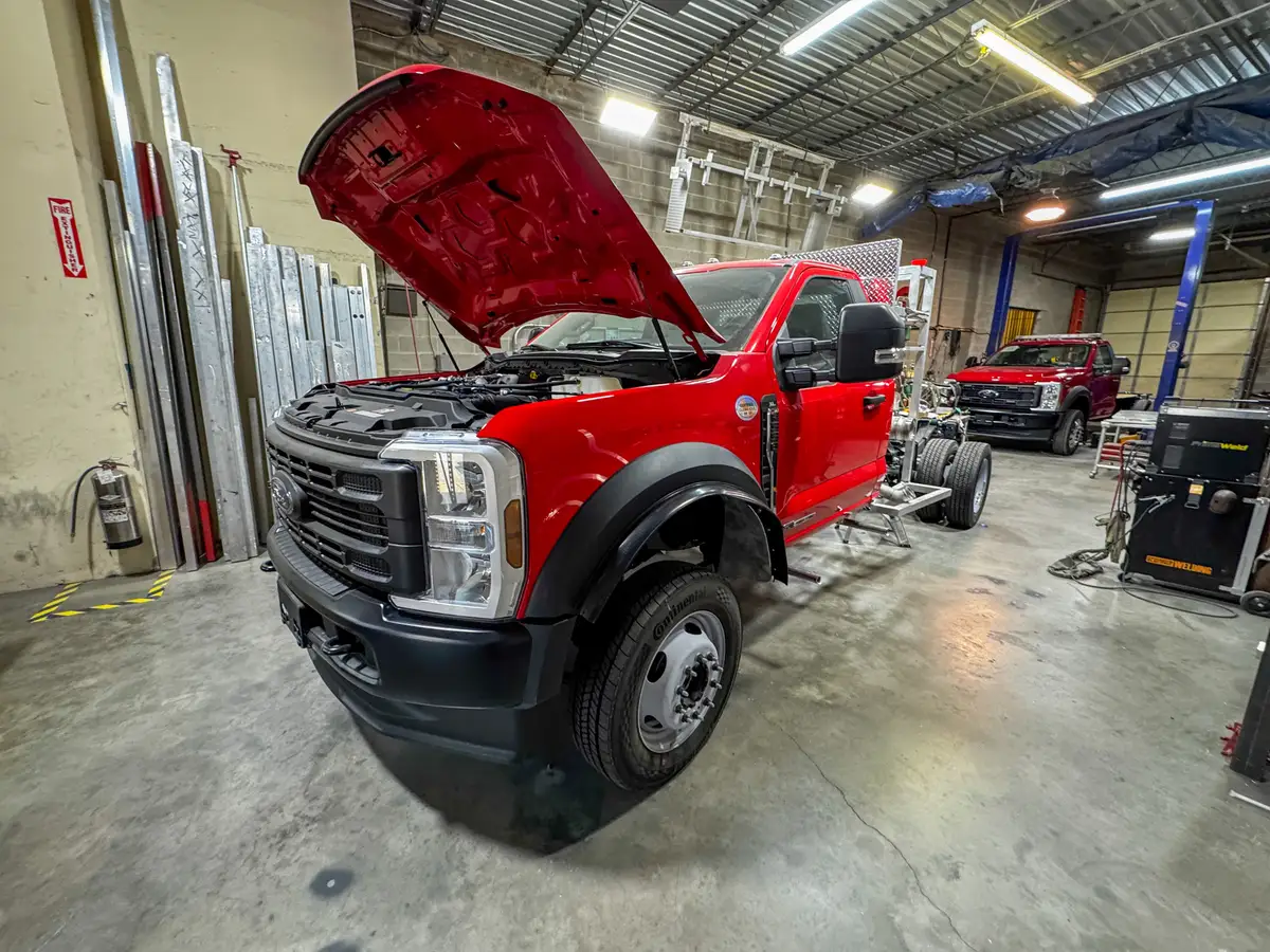Partially assembled apparatus body on shop floor, photo 160 of 179.