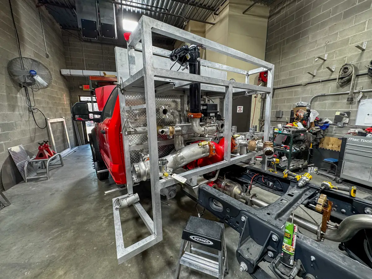 Unpainted aluminum compartment structure in shop, photo 162 of 179.