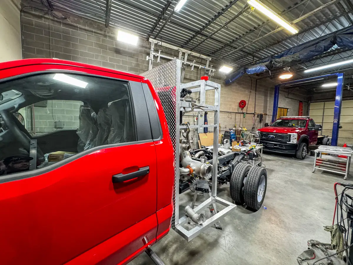 Body panels staged in production area, photo 168 of 179.