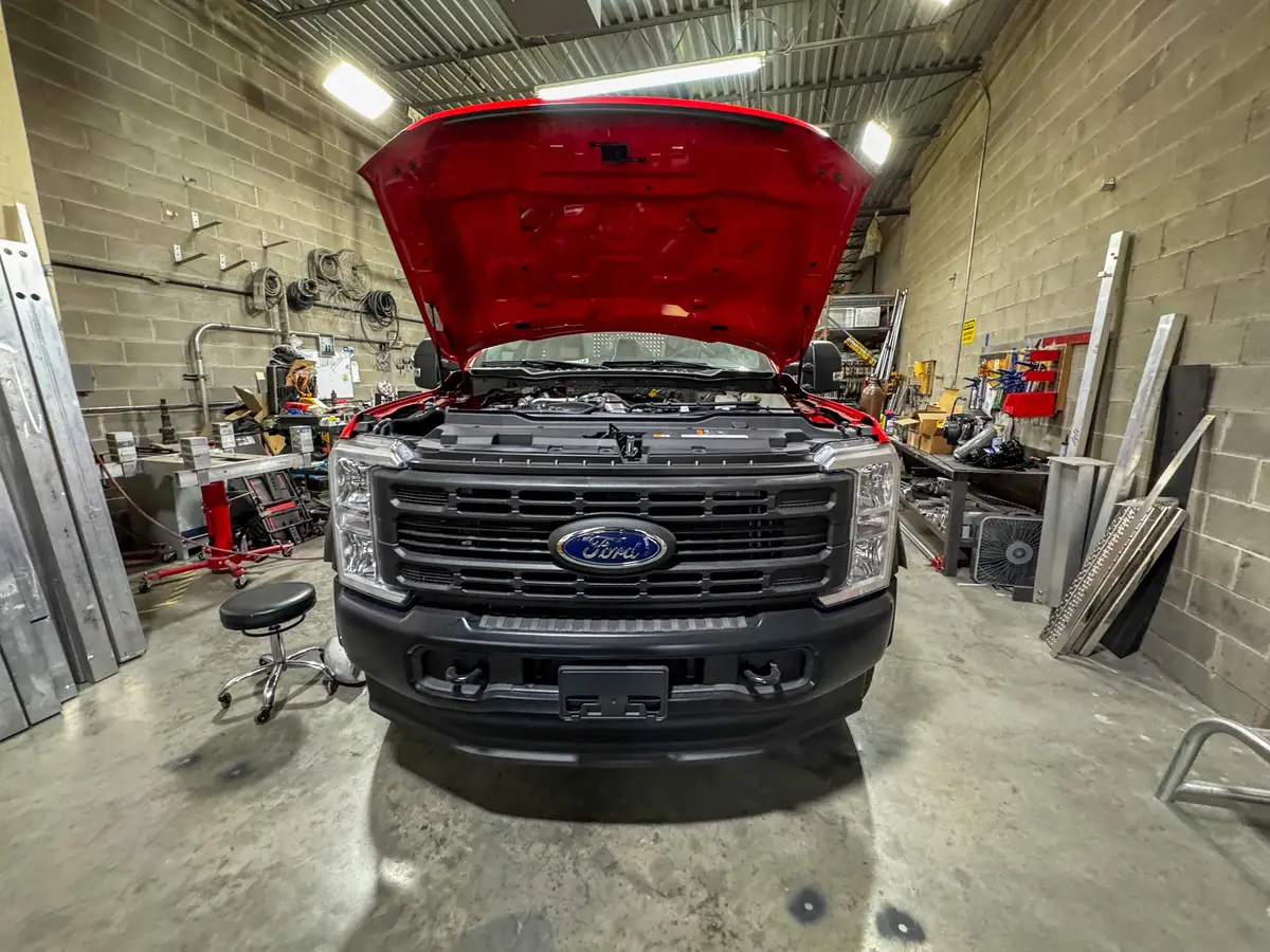 Open compartment with unfinished interior surfaces, photo 169 of 179.