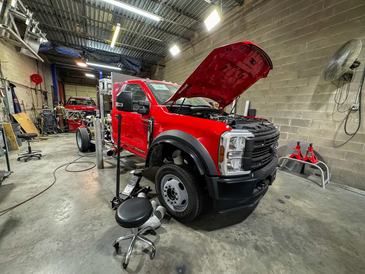 Partially assembled apparatus body on shop floor, photo 170 of 179.