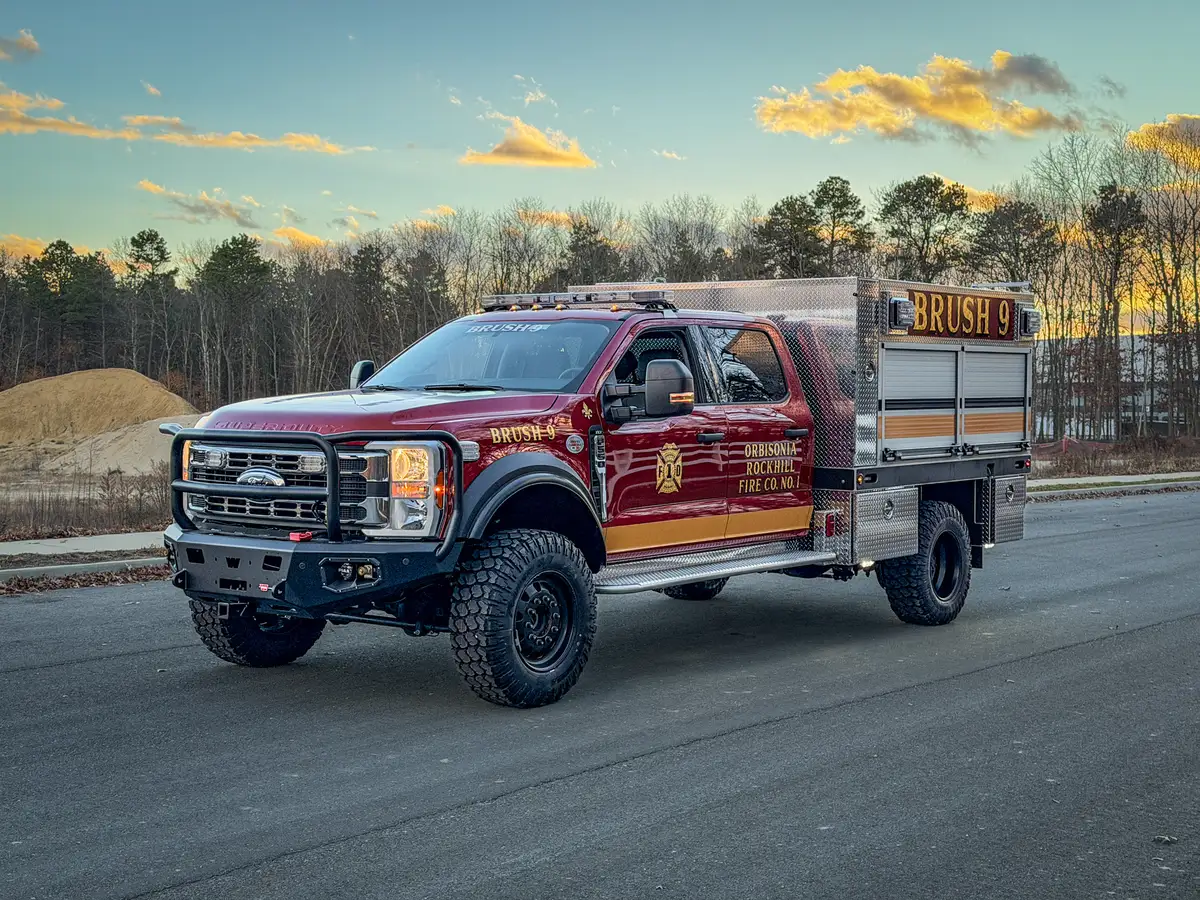 Front driver-side angle showing cab and utility body.