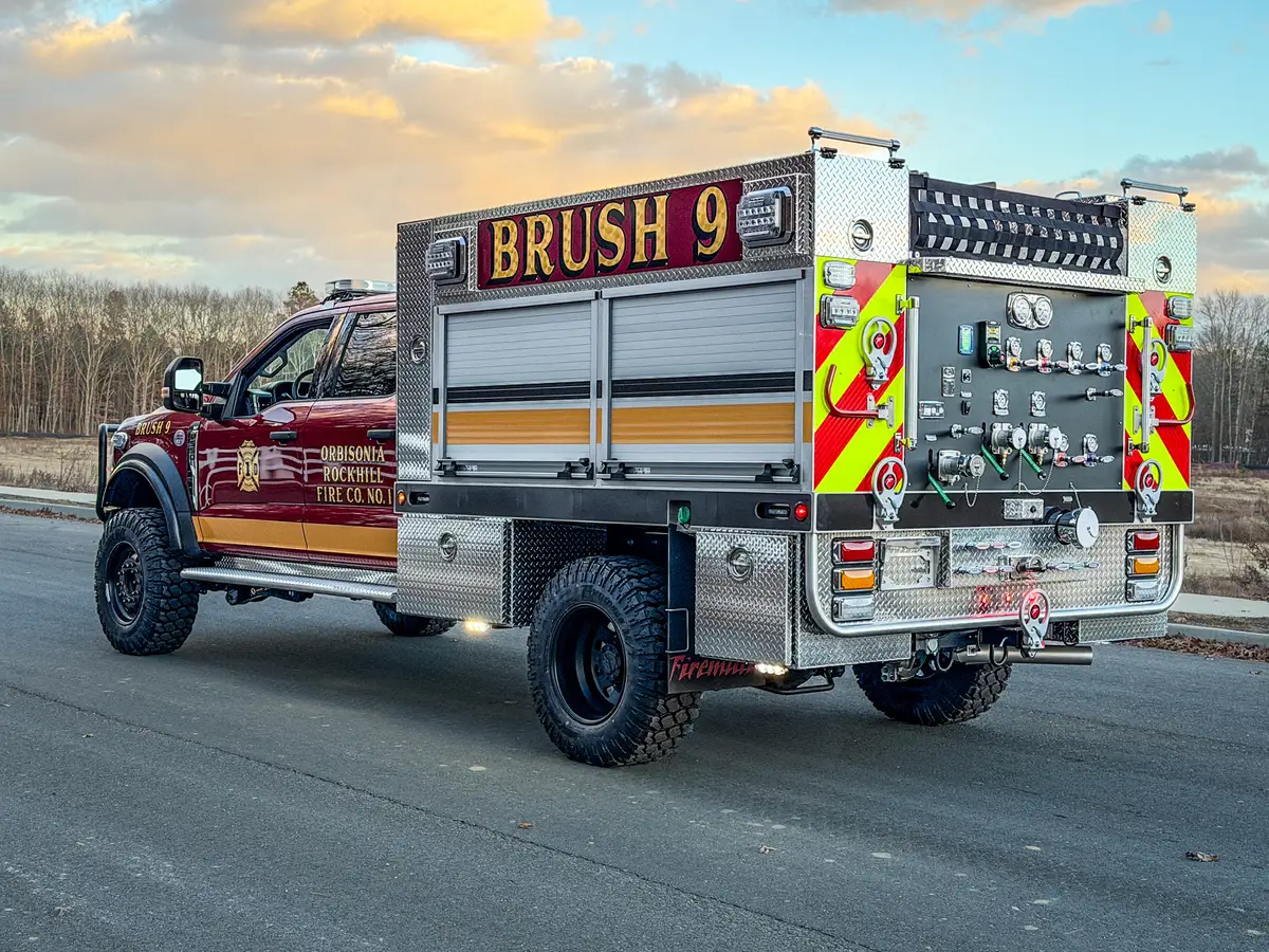 Rear passenger-side three-quarter view with chevron rear panel.