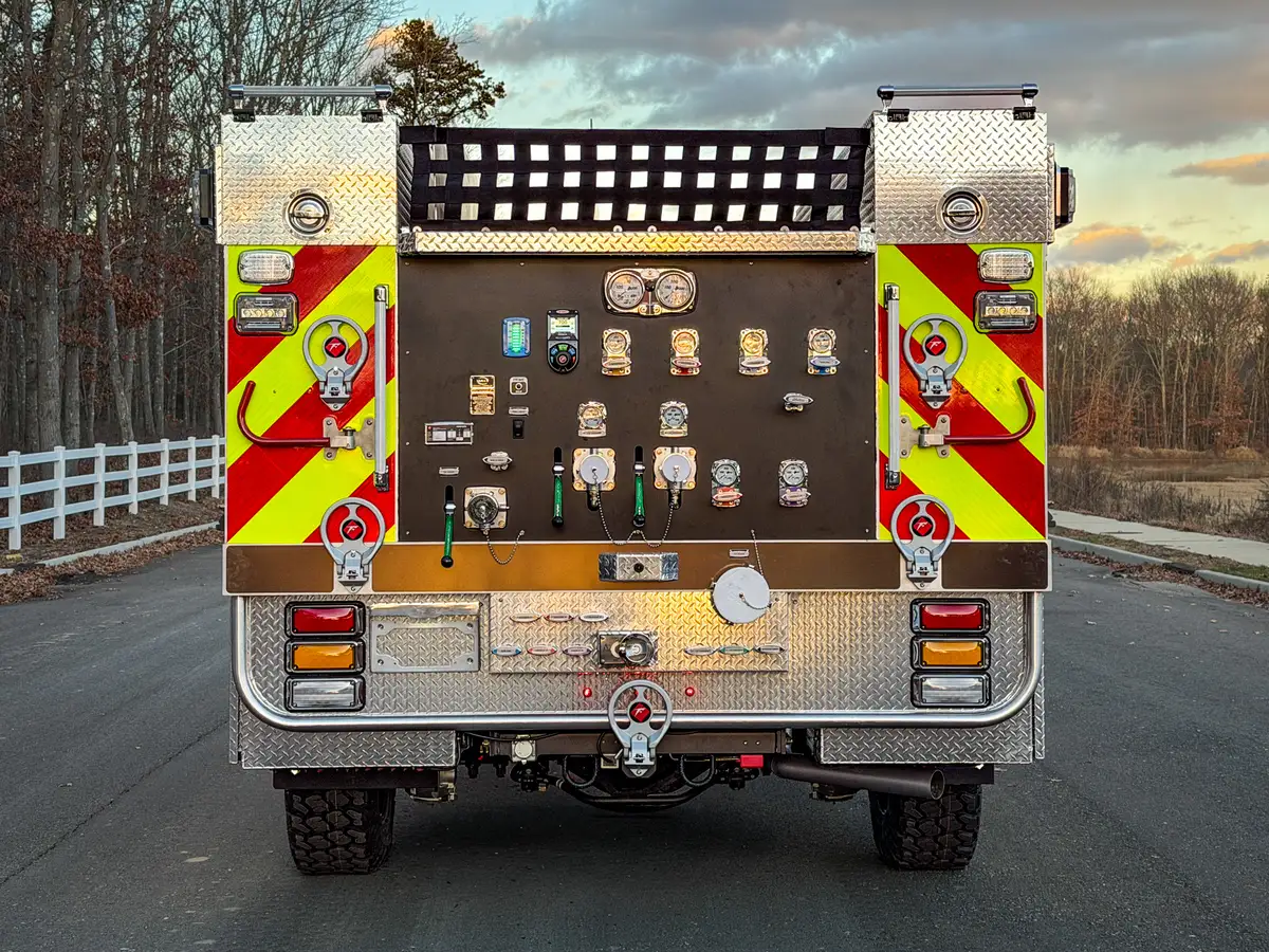 Straight rear view with control panel and chevron striping.