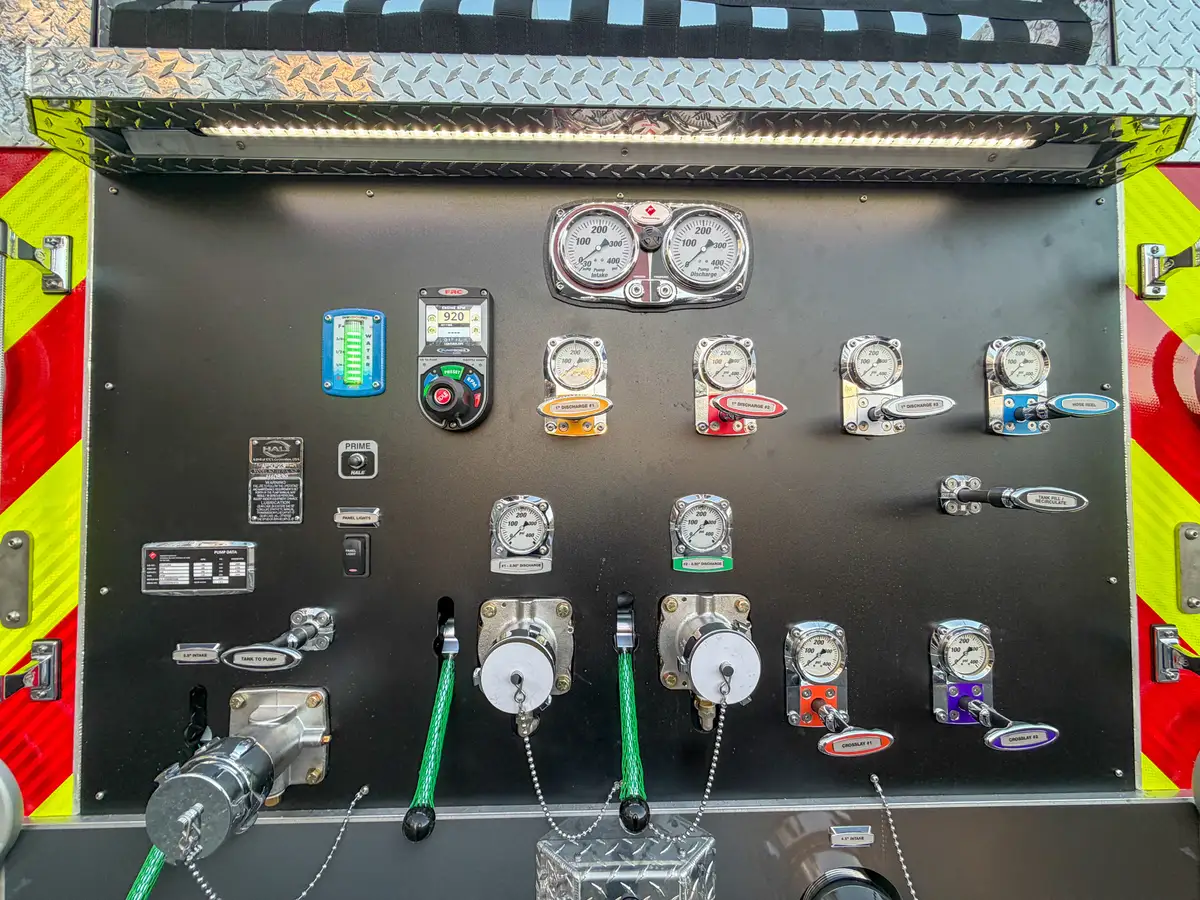 Close-up of rear pump control panel and labeled switches.