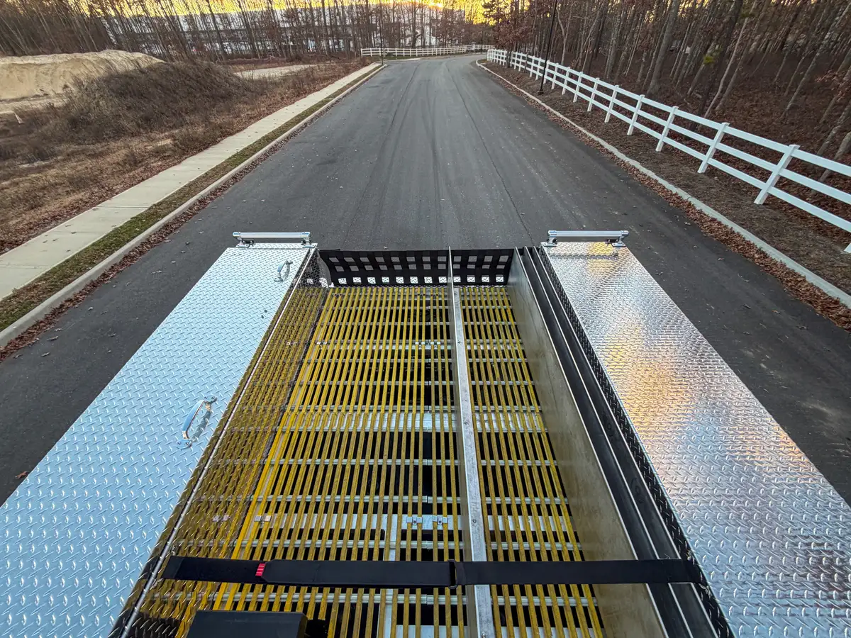 Long top walkway view with yellow grate panels.