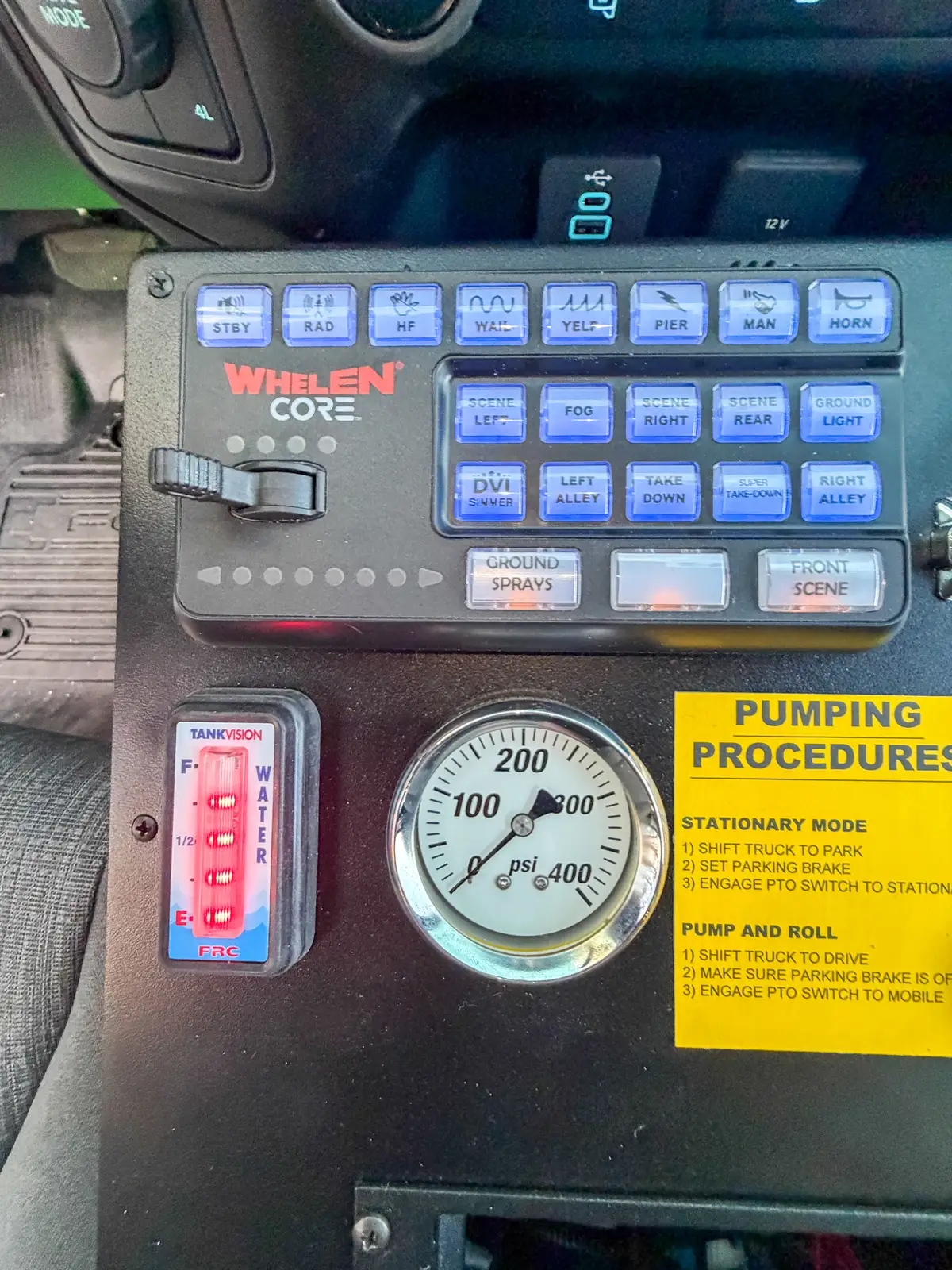 Close-up of control keypad and gauge on center console.