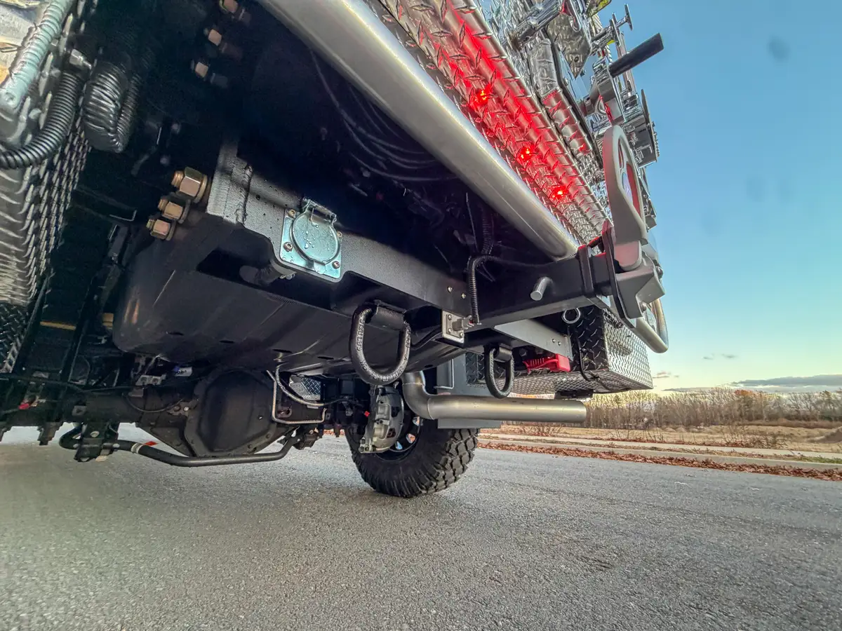 Low rear underbody view with suspension and frame components.