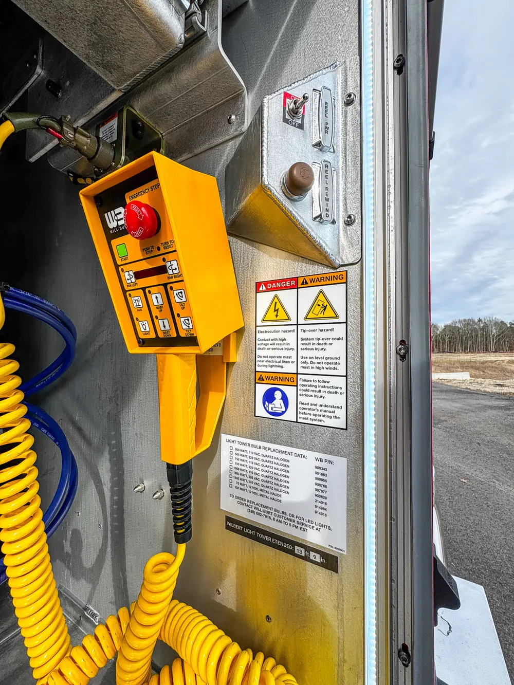 Alternate close view of control pendant and warning labels.