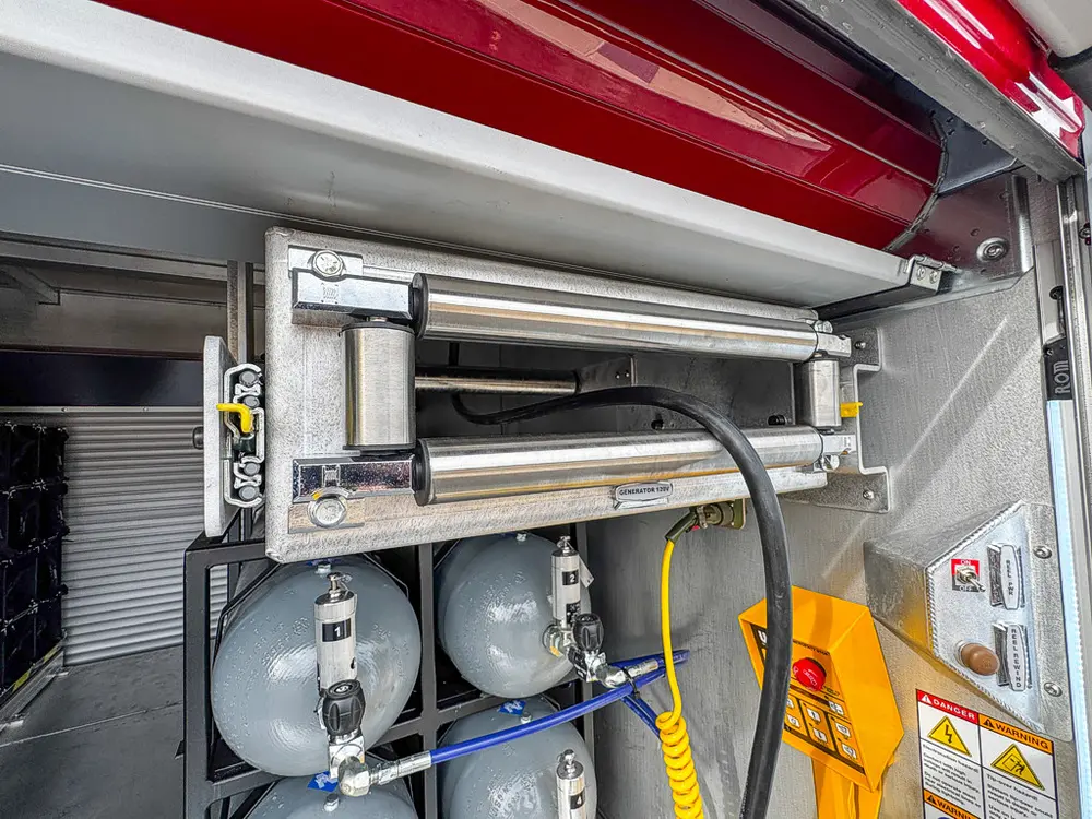 Detail of upper slide assembly over air cylinder bank.