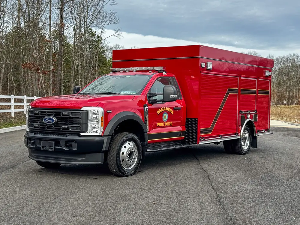 Front-left exterior view highlighting side compartment body.