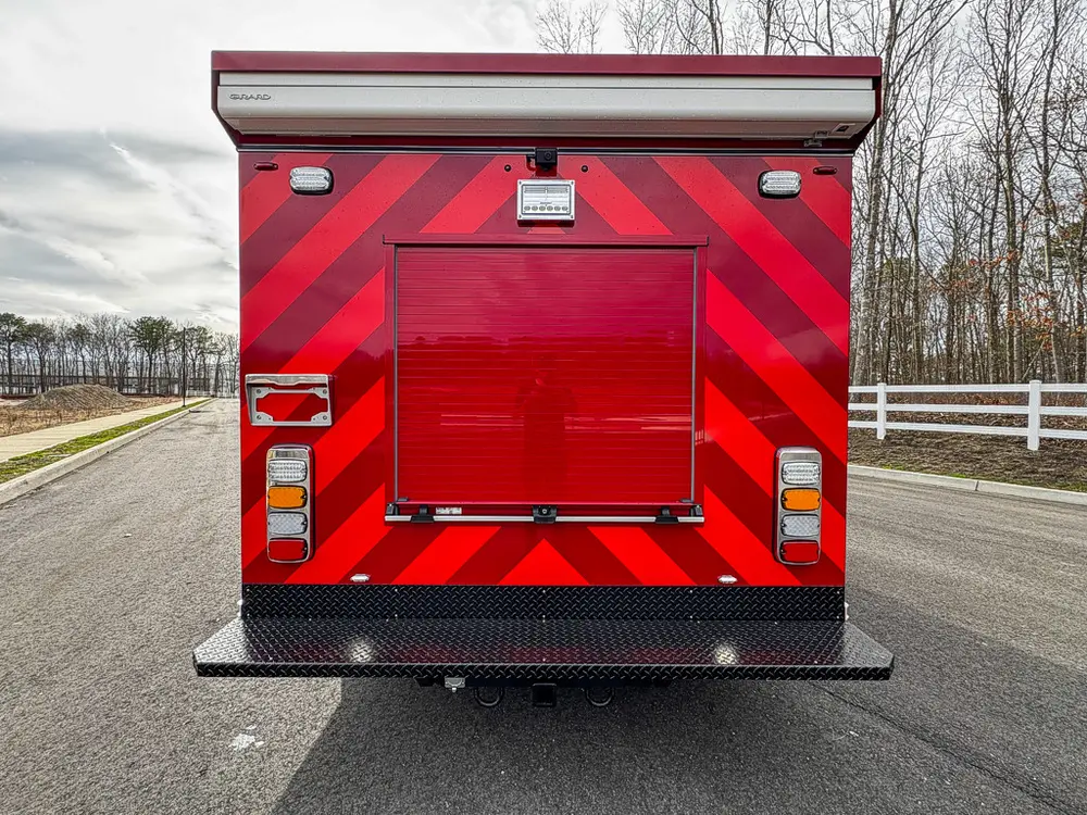 Direct rear view with rear compartment door closed.