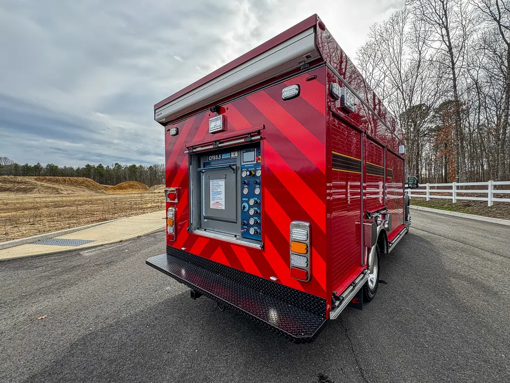 Rear-right exterior view with rear fill-station compartment open.