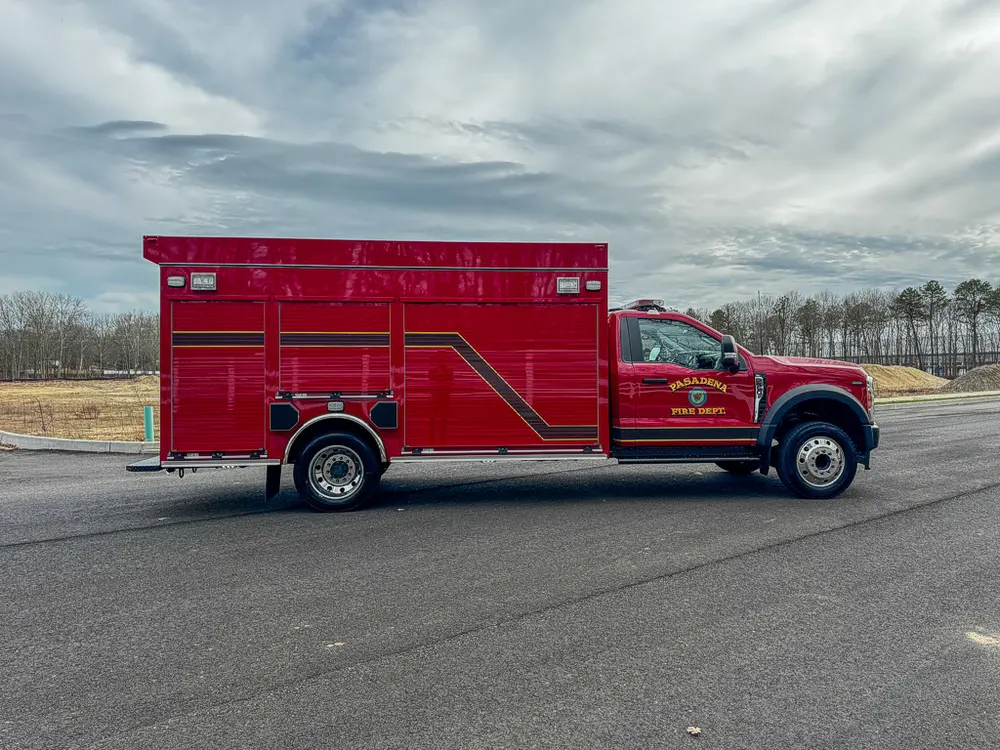 Full right-side profile of BRAT truck with doors closed.