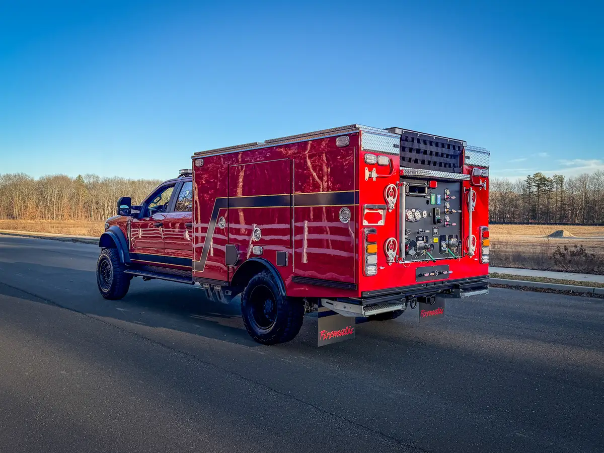 Rear three-quarter opposite-side view showing pump panel and side body.