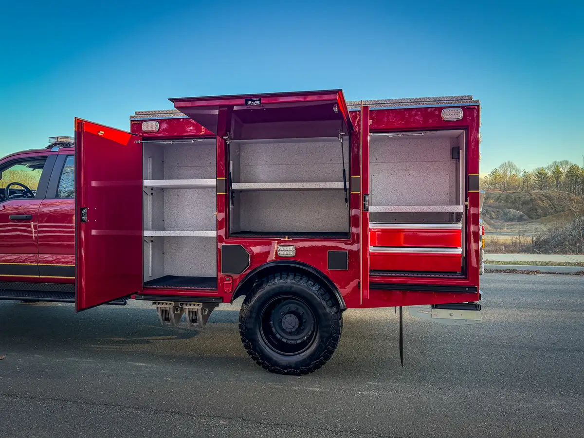 Right-side compartments open, showing empty shelves and drawer section.