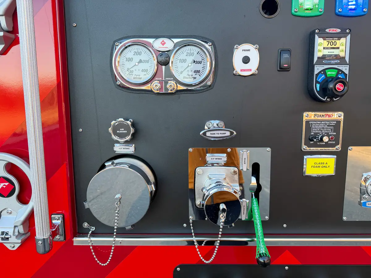 Left lower pump panel close-up with intake gauges and foam controls.