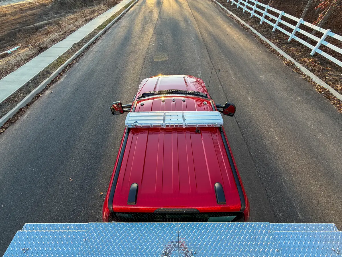 Top-down view of the red cab roof and roof-mounted light bar.
