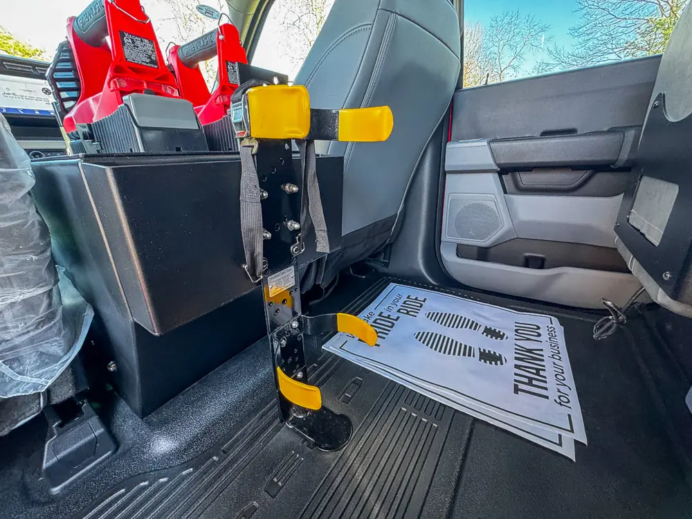 Rear floor and center console view from the side door opening.