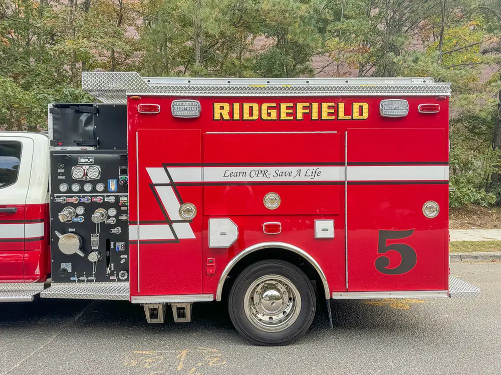 Right-side profile of rescue body with compartment doors closed.