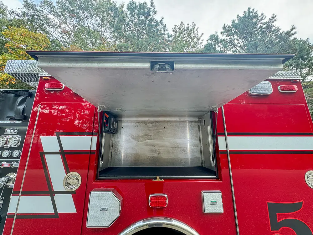 Open upper side compartment with deep shelf space.