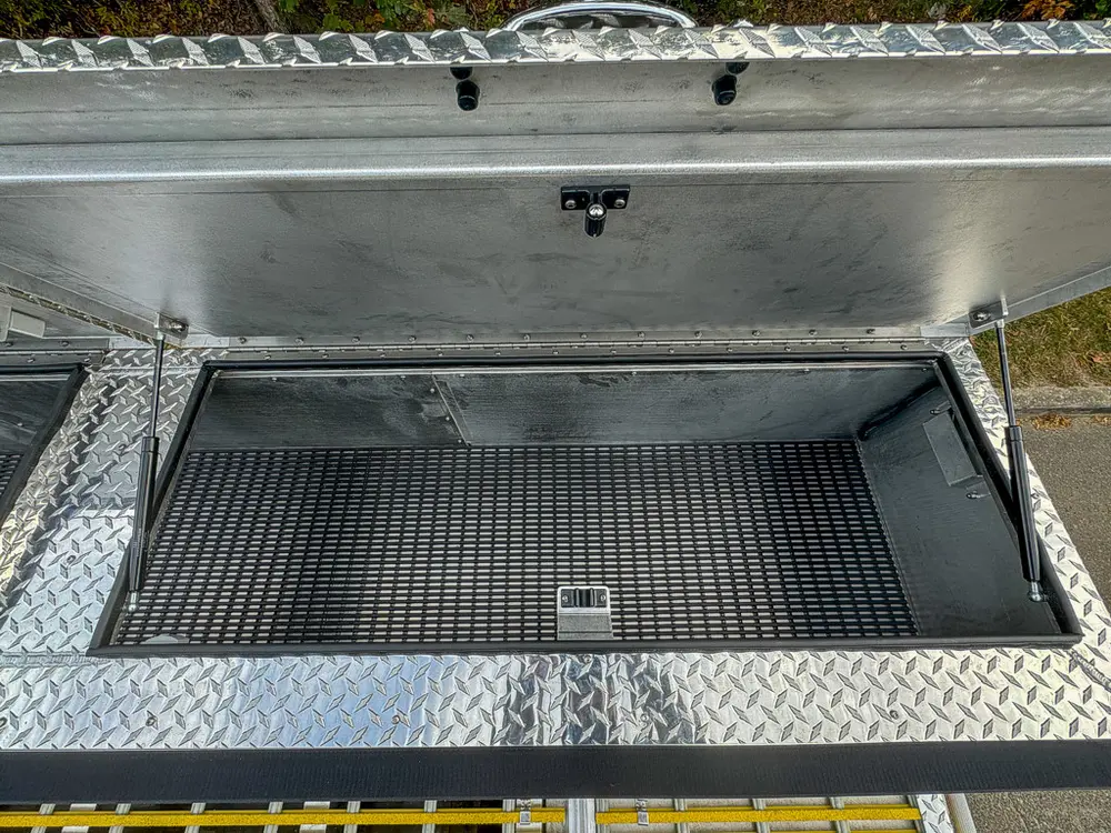 Second top rear compartment open with matching anti-slip surface.