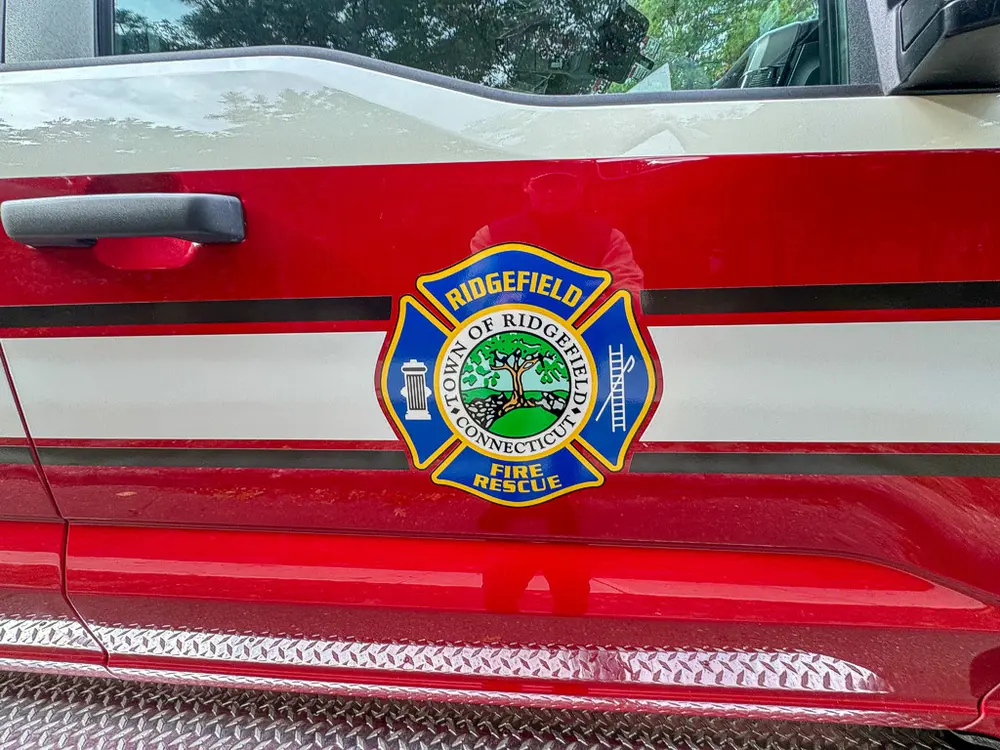 Driver door graphic close-up with Ridgefield Fire Department crest.