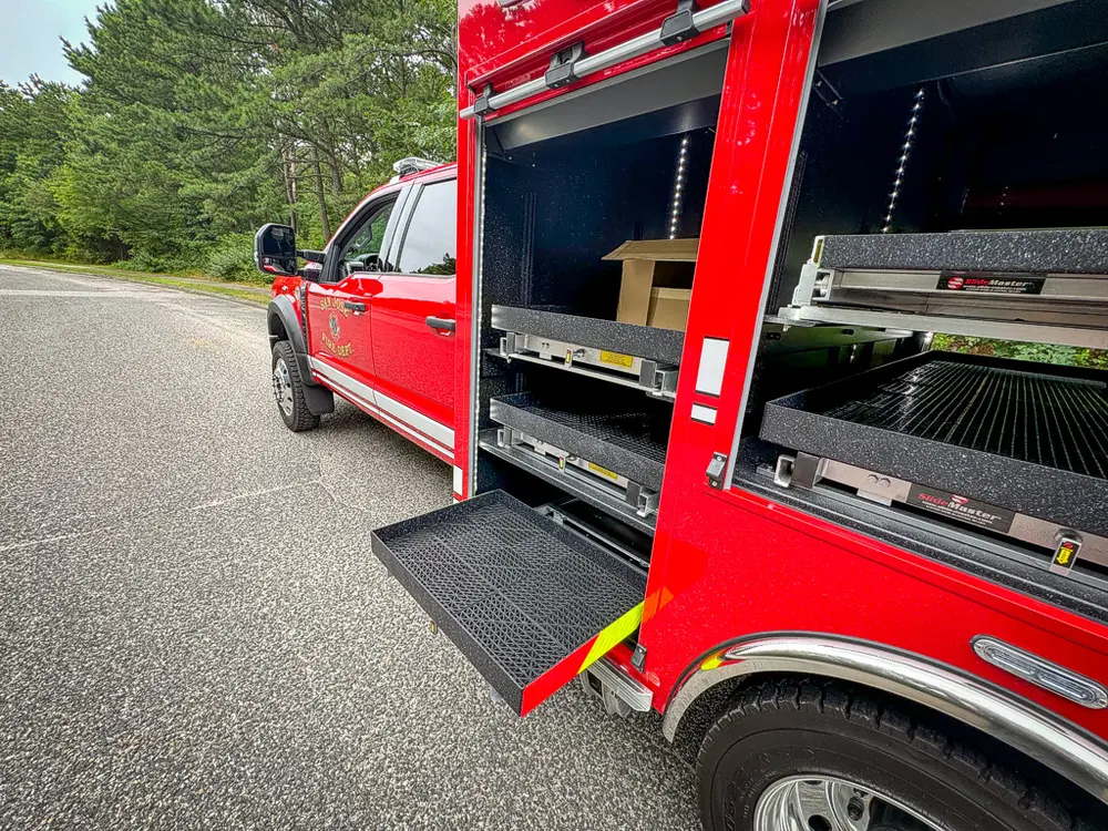 Long right-side compartment open with shelves and lower tray partially extended.