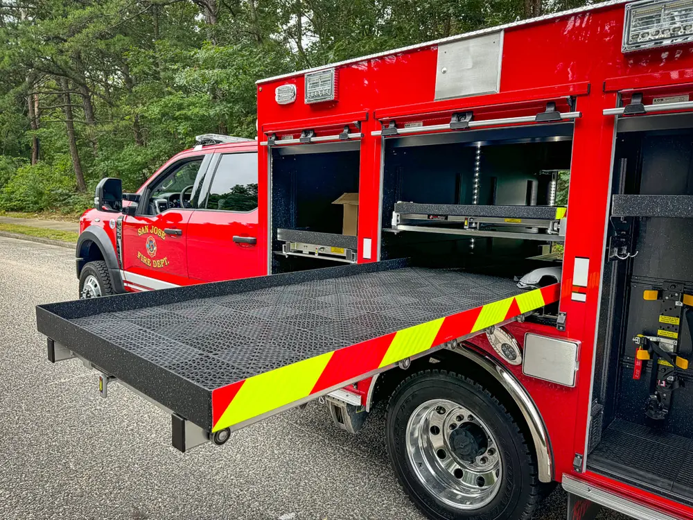 Side compartment view with full-width slide-out deck extended.