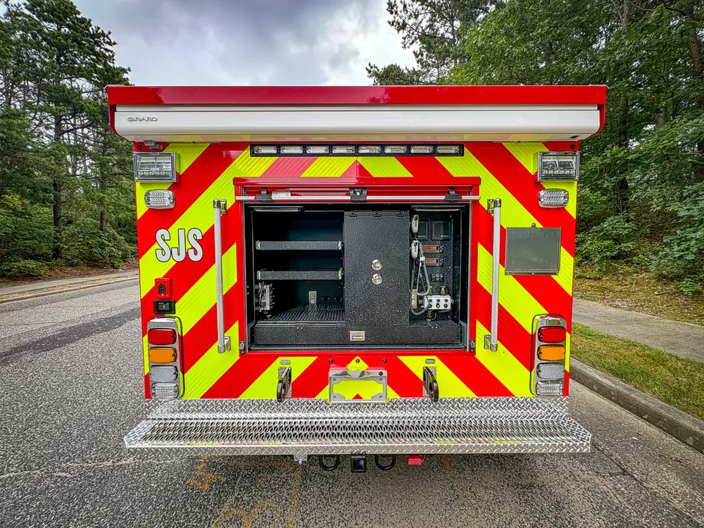 Straight rear view with center compartment open and interior shelving.