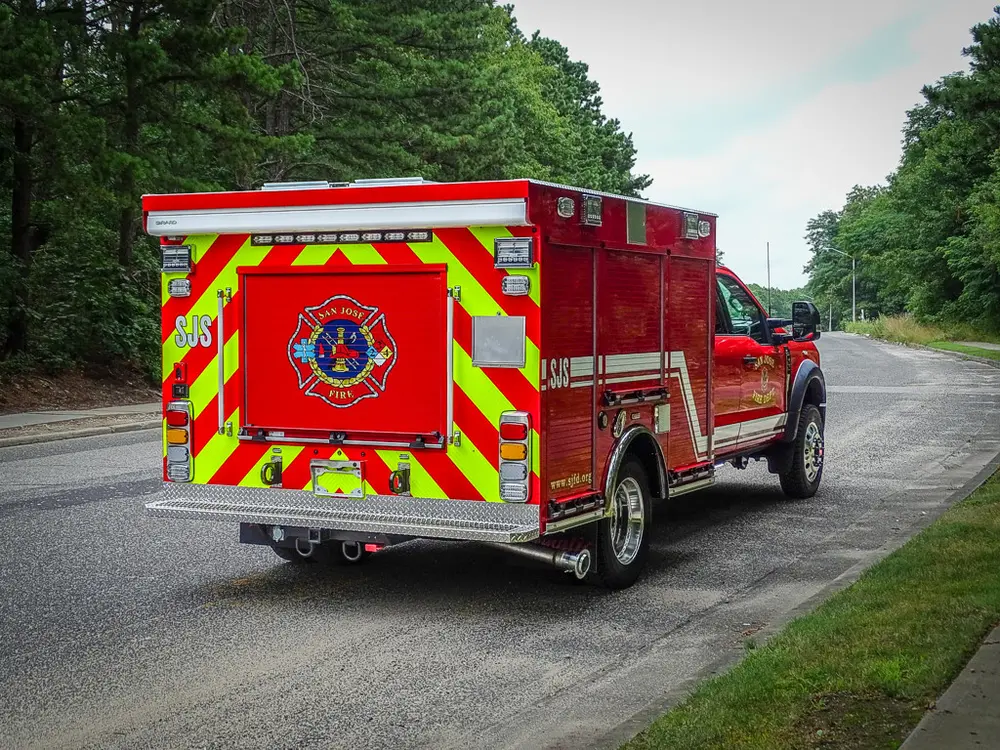 Rear-right three-quarter exterior view of truck body and cab.