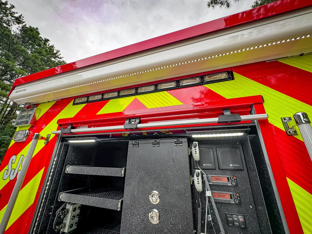 Rear bay close-up with shelves and side control panel exposed.