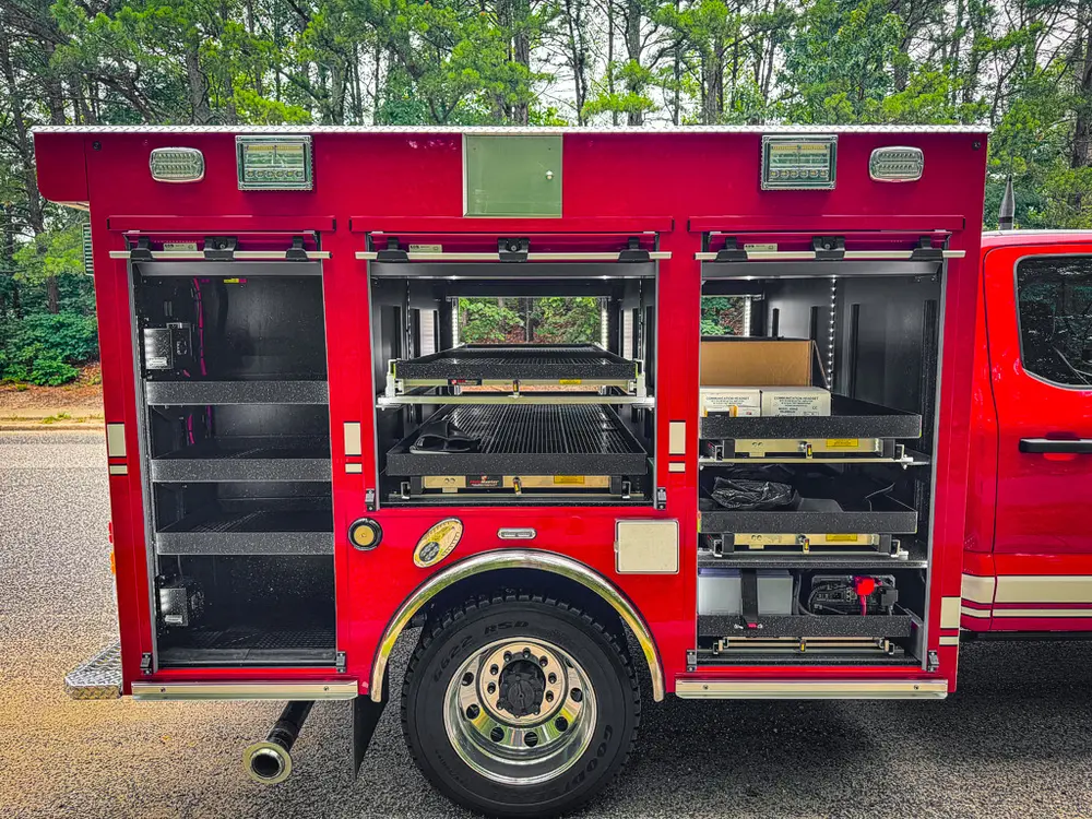 Right-side compartments open with multiple slide-out trays and shelves.