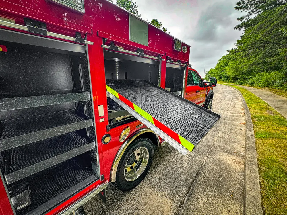 Wide right-side view with large fold-out side platform open.