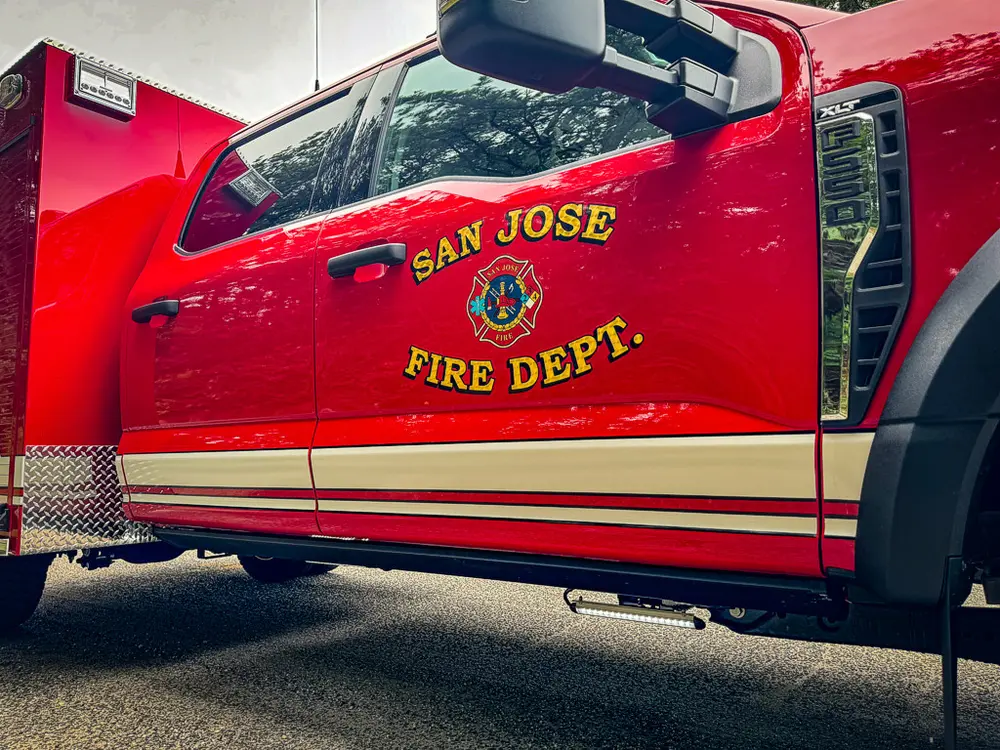 Driver door close-up with San Jose Fire Department emblem.