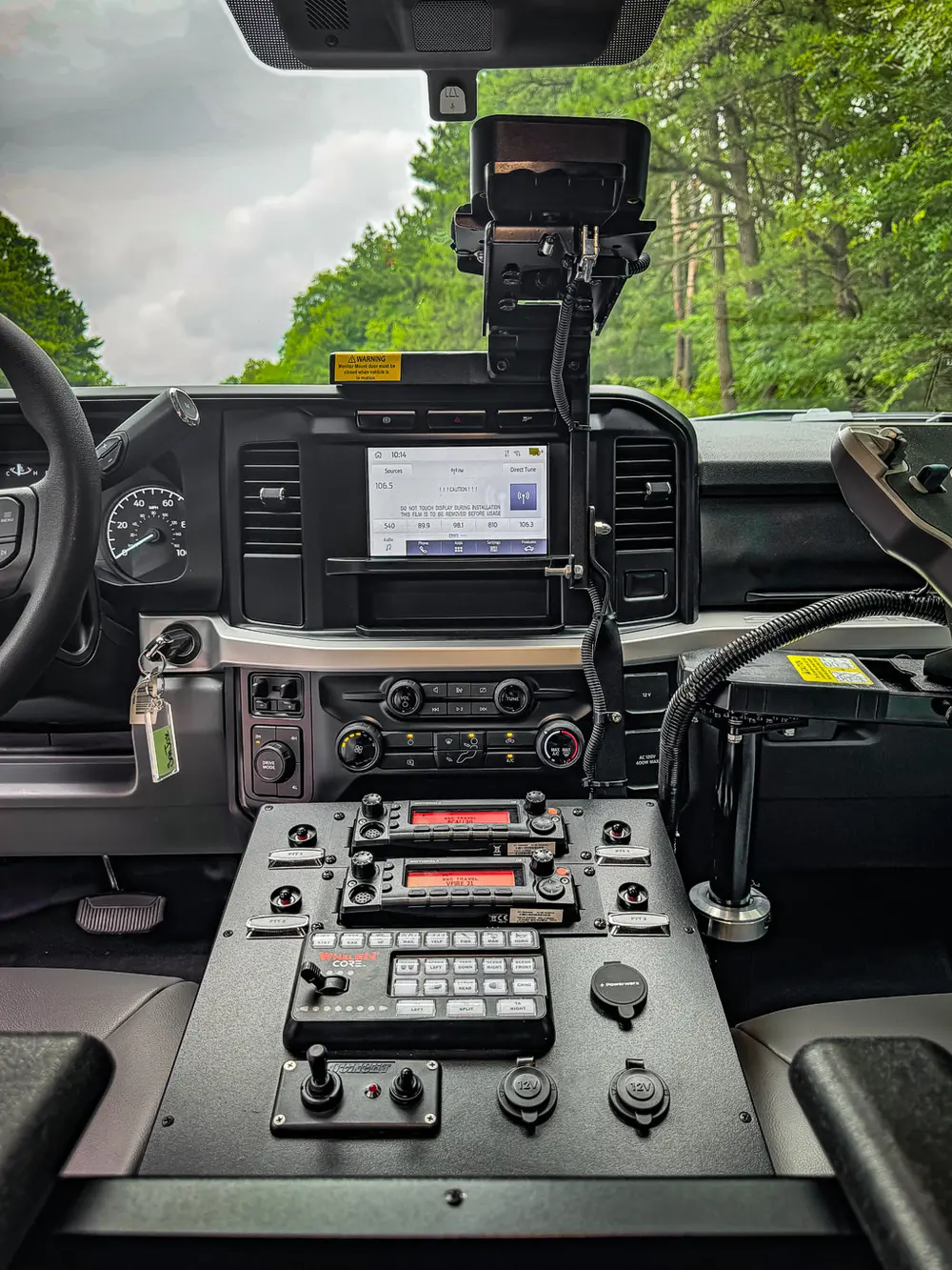 Full center stack view showing radio, controls, and in-cab devices.
