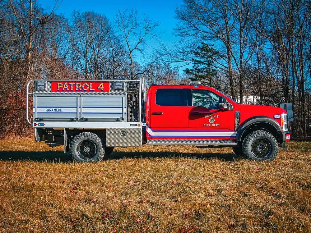 Right-side profile with rear body and Patrol 4 signage.