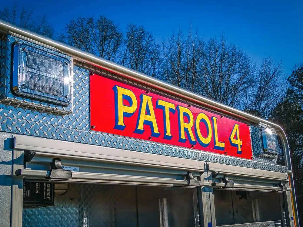 Patrol 4 side lettering close-up on upper body panel.