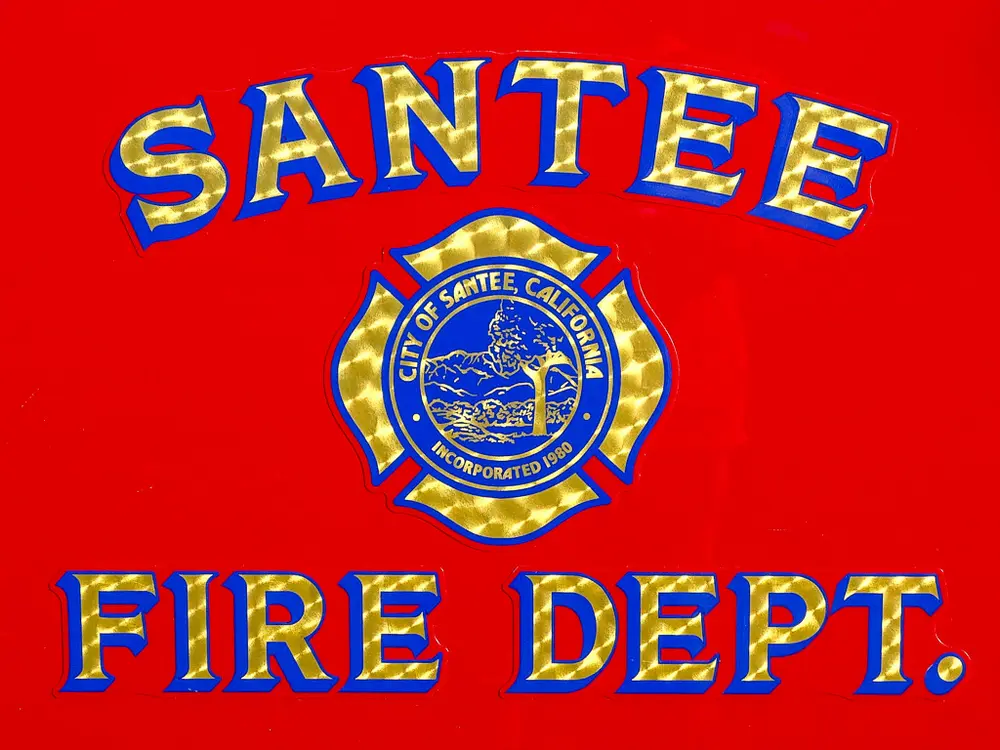 Door graphic close-up reading Santee Fire Department with crest.