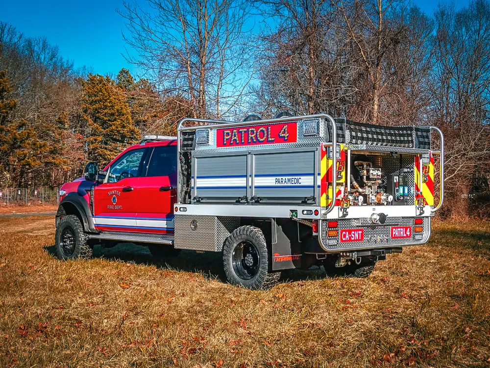Rear-right three-quarter view with rear chevrons and side body.