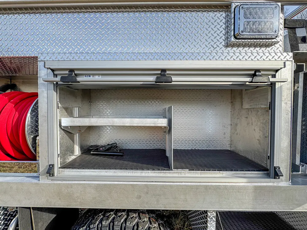 Red brush truck exterior or equipment detail, photo 20 of 97.