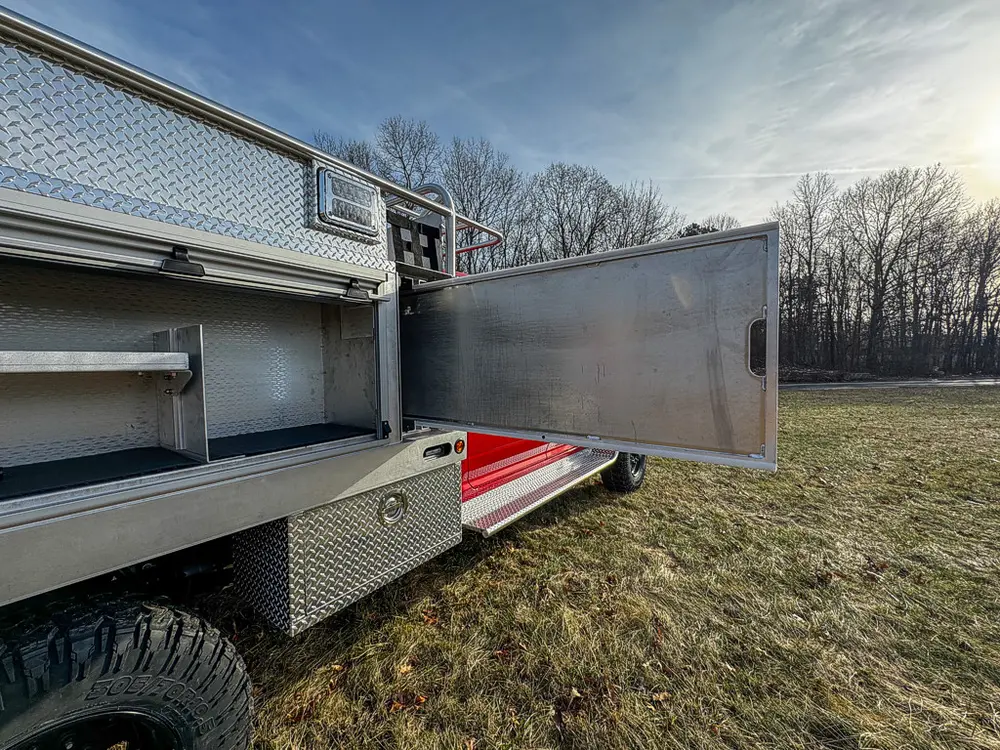 Red brush truck exterior or equipment detail, photo 24 of 97.