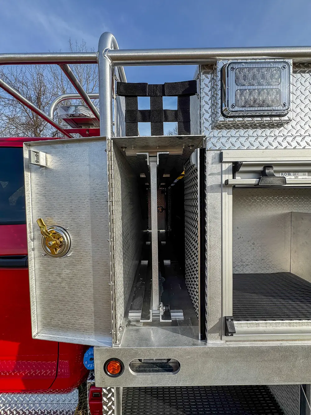 Red brush truck exterior or equipment detail, photo 38 of 97.