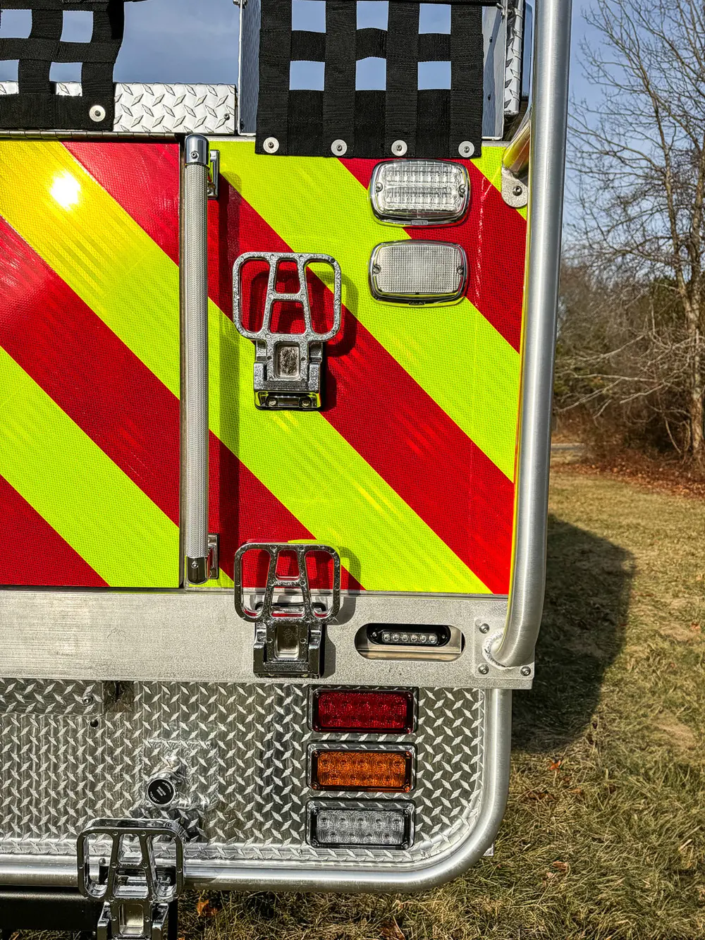 Red brush truck exterior or equipment detail, photo 49 of 97.
