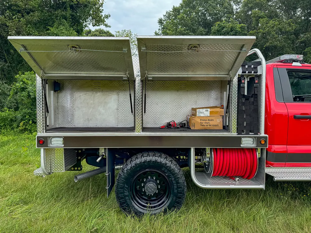 Open side compartments showing empty storage bays and shelves.